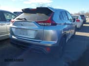 ✅ 2022 Mitsubishi Eclipse Cross LE • VIN: JA4ATVAA1NZ054677 • Лот: 43704732. Опубликован ранее на IAAI с пробегом 57 848 миль. Бесплатный доступ к архиву аукционных продаж из США и подробный отчёт об истории автомобиля на DreamBid. Изображение 4.