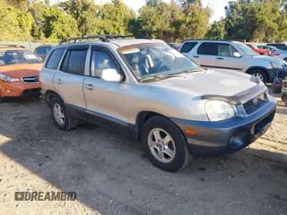 ✅ 2004 Hyundai Santa Fe GLS • VIN: KM8SC73E34U704154 • Lot: 43380665. Listed on IAAI with 68,777 mi. Free auction sales archive from the USA and detailed vehicle history report at DreamBid. Image 1.