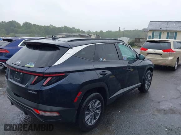 2023 Hyundai Tucson Blue z VIN KM8JBCA10PU092863, wystawiony jako IAAI lot #43233471 z przebiegiem 53 213 mil mil oraz . Historia ofert i sprzedaży dostępna na DreamBid. Obrazek 4.