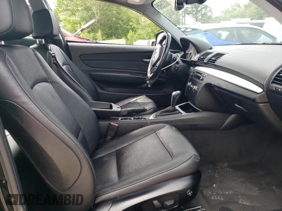 ✅ 2012 BMW 1 Series 128i • VIN: WBAUP7C54CVP23190 • Лот: 64003595. Опубликован ранее на Copart с пробегом 127 660 миль. Бесплатный доступ к архиву аукционных продаж из США и подробный отчёт об истории автомобиля на DreamBid. Изображение 7.