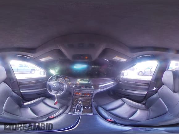 ✅ 2015 BMW 7 Series 750i • VIN: WBAYA8C54FD825401 • Lot: 67568435. Listed on Copart with 139,594 mi. Free auction sales archive from the USA and detailed vehicle history report at DreamBid. Image 14.