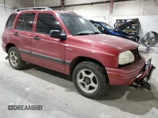 ✅ 1999 Suzuki Vitara JX • VIN: 2S3TD52V4X6110057 • Lot: 87752215. Wystawiony na Copart z przebiegiem 245 419 mil. Bezpłatny archiwum sprzedaży aukcyjnych z USA i szczegółowy raport historii pojazdu na DreamBid. Zdjęcie 4.