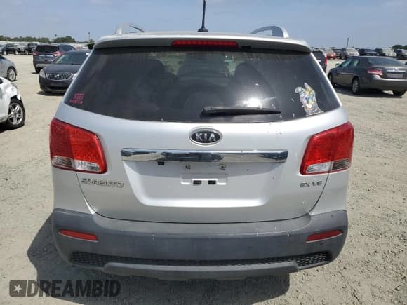 ✅ 2013 Kia Sorento EX • VIN: 5XYKUDA23DG411929 • Lot: 54327335. Listed on Copart with 141,926 mi. Free auction sales archive from the USA and detailed vehicle history report at DreamBid. Image 6.