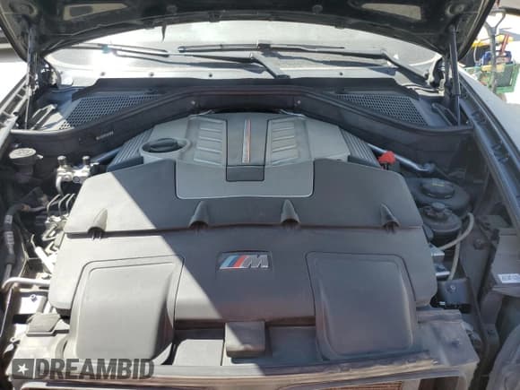 ✅ 2014 BMW X6 M • VIN: 5YMGZ0C53E0C40737 • Lot: 72794934. Listed on Copart with 64,936 mi. Free auction sales archive from the USA and detailed vehicle history report at DreamBid. Image 12.