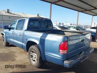 ✅ 2002 Dodge Dakota Sport • VIN: 1B7HL38N22S652119 • Лот: 43395458. Опубликован ранее на IAAI с пробегом 162 733 миль. Бесплатный доступ к архиву аукционных продаж из США и подробный отчёт об истории автомобиля на DreamBid. Изображение 3.