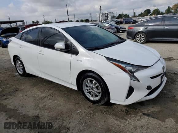 2017 Toyota Prius Two z VIN JTDKBRFUXH3038959, wystawiony jako Copart lot #71670975 z przebiegiem 314 882 mil mil oraz Szkoda całkowita • Salvage title. Historia ofert i sprzedaży dostępna na DreamBid. Obrazek 4.