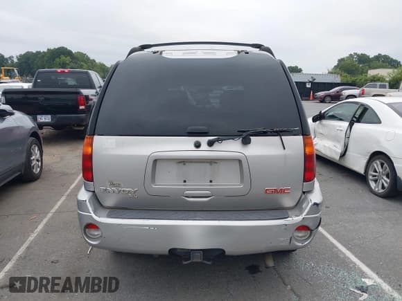 ✅ 2004 GMC Envoy SLE • VIN: 1GKES16S746136499 • Lot: 43016716. Listed on IAAI with 306,631 mi. Free auction sales archive from the USA and detailed vehicle history report at DreamBid. Image 16.