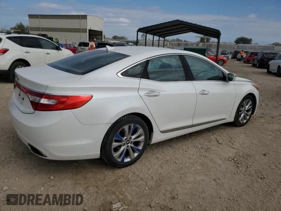 ✅ 2013 Hyundai Azera • VIN: KMHFG4JGXDA199367 • Лот: 82405005. Опубликован ранее на Copart с пробегом 215 300 миль. Бесплатный доступ к архиву аукционных продаж из США и подробный отчёт об истории автомобиля на DreamBid. Изображение 3.