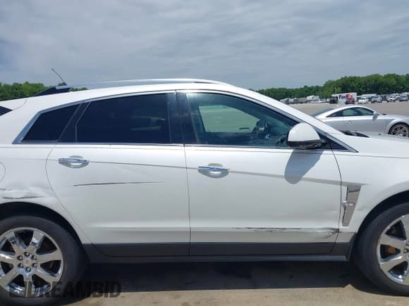 ✅ 2010 Cadillac SRX Performance Collection • VIN: 3GYFNEEY4AS548899 • Lot: 42216296. Wystawiony na IAAI z przebiegiem 228 903 mil. Bezpłatny archiwum sprzedaży aukcyjnych z USA i szczegółowy raport historii pojazdu na DreamBid. Zdjęcie 14.