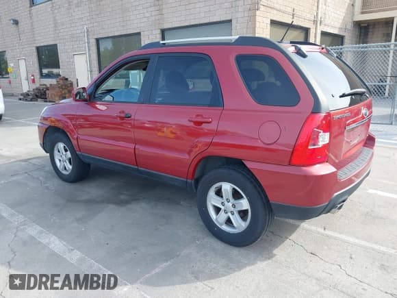 ✅ 2009 Kia Sportage EX • VIN: KNDJF723097574010 • Lot: 42259136. Listed on IAAI with 220,144 mi. Free auction sales archive from the USA and detailed vehicle history report at DreamBid. Image 3.