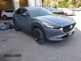 ✅ 2023 Mazda CX-30 S Carbon Edition • VIN: 3MVDMBCM2PM551682 • Lot: 42407698. Listed on IAAI with 10,952 mi. Free auction sales archive from the USA and detailed vehicle history report at DreamBid. Image 1.