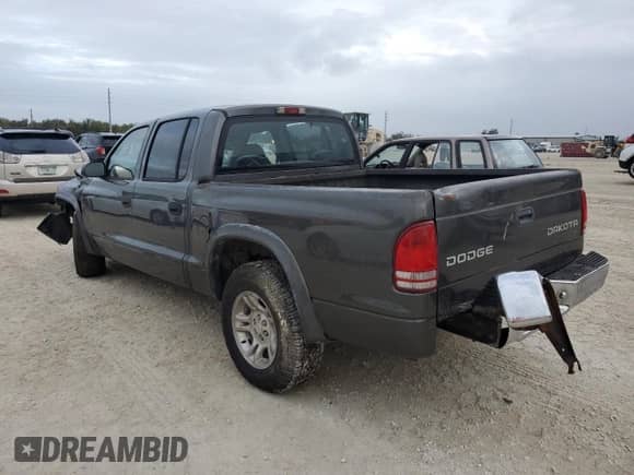 2004 Dodge Dakota Sport с VIN 1D7HL38K64S520463, выставлен на аукционе Copart как лот 79697504 с пробегом Не указан миль и Чистый • Clean title. История ставок и продаж доступна на DreamBid. Изображение 2.