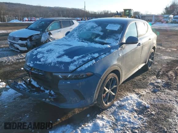 2024 Dodge Hornet R/T with VIN ZACPDFCW2R3A08184, listed as a IAAI auction lot 41355339 with 8,658 mi miles and . Bid and sale history available at DreamBid. Image 2.