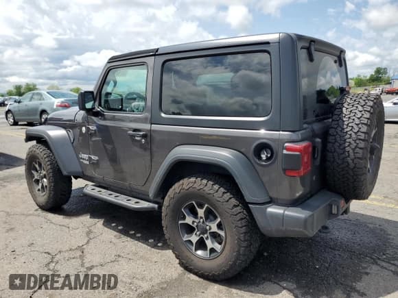 ✅ 2019 Jeep Wrangler Sport S • VIN: 1C4HJXAN2KW609433 • Lot: 57421535. Listed on Copart with 51,287 mi. Free auction sales archive from the USA and detailed vehicle history report at DreamBid. Image 2.