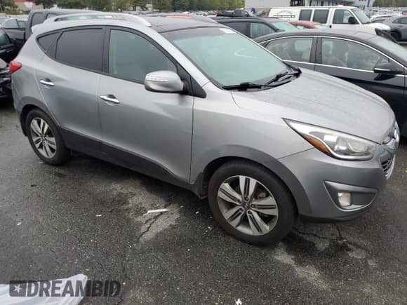2014 Hyundai Tucson SE z VIN KM8JU3AG8EU948373, wystawiony jako Copart lot #81754305 z przebiegiem 227 555 mil mil oraz Czysty tytuł • Clean title. Historia ofert i sprzedaży dostępna na DreamBid. Obrazek 4.