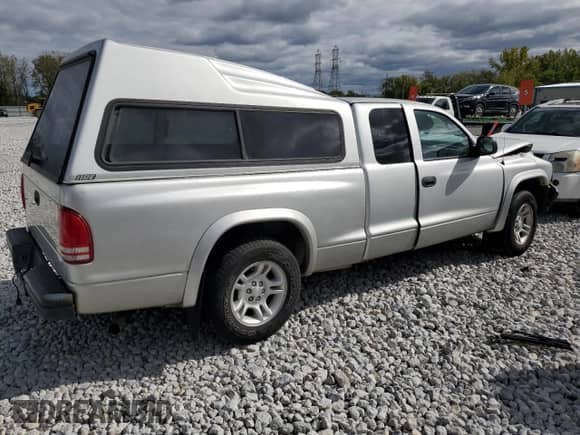 2004 Dodge Dakota с VIN 1D7GL12K24S653634, выставлен на аукционе Copart как лот 74799854 с пробегом 183 971 миль миль и Списание • Salvage title. История ставок и продаж доступна на DreamBid. Изображение 3.