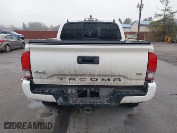 ✅ 2023 Toyota Tacoma SR • VIN: 3TYCZ5AN3PT163151 • Lot: 43737867. Listed on IAAI with 22,403 mi. Free auction sales archive from the USA and detailed vehicle history report at DreamBid. Image 16.