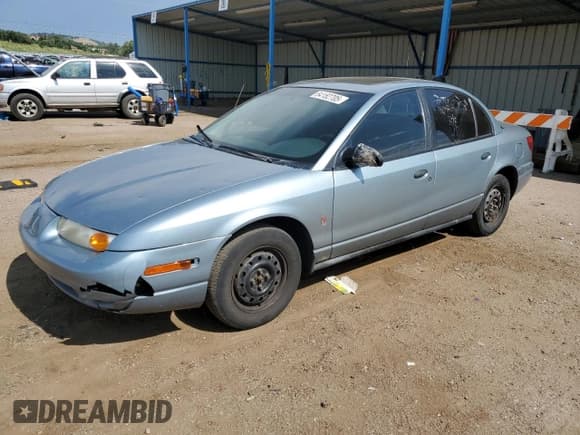 ✅ 2002 Saturn SL • VIN: 1G8ZH52852Z125665 • Lot: 64182705. Wystawiony na Copart z przebiegiem 167 641 mil. Bezpłatny archiwum sprzedaży aukcyjnych z USA i szczegółowy raport historii pojazdu na DreamBid. Zdjęcie 1.