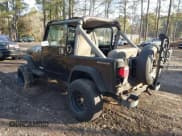 ✅ 1990 Jeep Wrangler S • VIN: 2J4FY19E1LJ505667 • Lot: 42788286. Listed on IAAI with 207,813 mi. Free auction sales archive from the USA and detailed vehicle history report at DreamBid. Image 3.