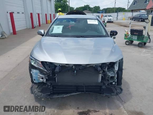 2021 Toyota Camry Hybrid LE z VIN 4T1C31AK2MU022229, wystawiony jako IAAI lot #42633309 z przebiegiem 37 463 mil mil oraz . Historia ofert i sprzedaży dostępna na DreamBid. Obrazek 12.