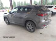 ✅ 2024 Mazda CX-5 Signature • VIN: JM3KFBXYXR0387692 • Lot: 42610108. Listed on IAAI with 15,464 mi. Free auction sales archive from the USA and detailed vehicle history report at DreamBid. Image 3.