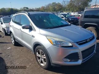 ✅ 2015 Ford Escape SE • VIN: 1FMCU0GX0FUC10860 • Lot: 43601320. Listed on IAAI with 169,944 mi. Free auction sales archive from the USA and detailed vehicle history report at DreamBid. Image 1.