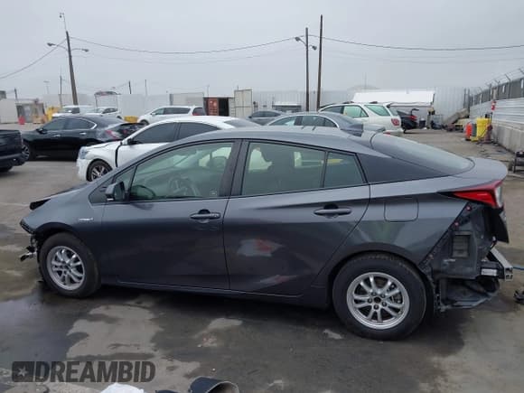 ✅ 2021 Toyota Prius L Eco • VIN: JTDKAMFU8M3144391 • Лот: 42477718. Опубликован ранее на IAAI с пробегом 314 346 миль. Бесплатный доступ к архиву аукционных продаж из США и подробный отчёт об истории автомобиля на DreamBid. Изображение 15.