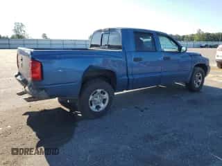 2005 Dodge Dakota ST с VIN 1D7HE28KX5S204098, выставлен на аукционе Copart как лот 69924624 с пробегом 326 213 миль миль и Списание • Salvage title. История ставок и продаж доступна на DreamBid. Изображение 3.