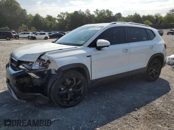 ✅ 2022 Volkswagen Taos SE • VIN: 3VVYX7B28NM023165 • Лот: 66815215. Опубликован ранее на Copart с пробегом 56 369 миль. Бесплатный доступ к архиву аукционных продаж из США и подробный отчёт об истории автомобиля на DreamBid. Изображение 1.