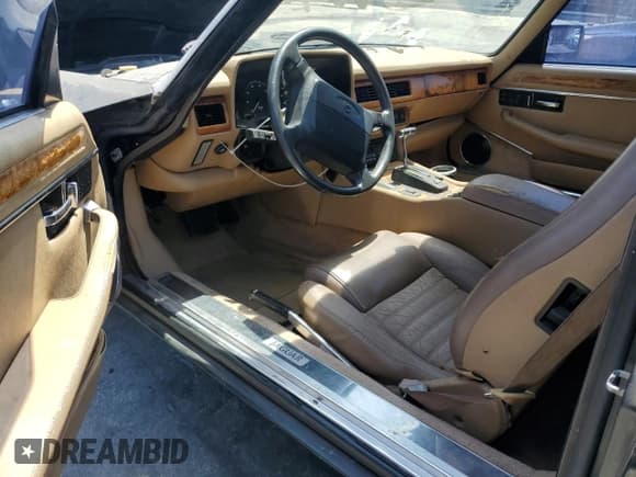 ✅ 1994 Jaguar XJS • VIN: SAJNX4748RC188121 • Lot: 61803865. Wystawiony na Copart z przebiegiem 137 102 mil. Bezpłatny archiwum sprzedaży aukcyjnych z USA i szczegółowy raport historii pojazdu na DreamBid. Zdjęcie 8.