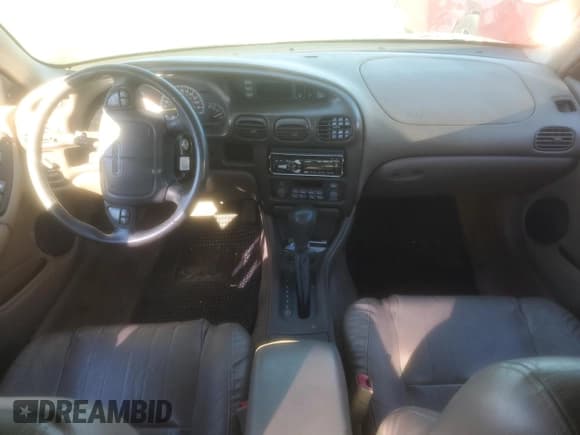 ✅ 2000 Pontiac Grand Prix GT • VIN: 1G2WP52K6YF289495 • Лот: 69342584. Опубликован ранее на Copart с пробегом 199 599 миль. Бесплатный доступ к архиву аукционных продаж из США и подробный отчёт об истории автомобиля на DreamBid. Изображение 8.