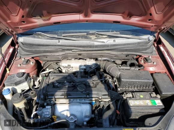 2010 Hyundai Accent GLS z VIN KMHCN4AC6AU423086, wystawiony jako Copart lot #62217374 z przebiegiem 205 962 mil mil oraz Szkoda całkowita • Salvage title. Historia ofert i sprzedaży dostępna na DreamBid. Obrazek 11.