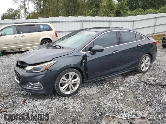 ✅ 2017 Chevrolet Cruze Premier • VIN: 1G1BF5SM3H7184883 • Lot: 89847285. Listed on Copart with 136,018 mi. Free auction sales archive from the USA and detailed vehicle history report at DreamBid. Image 1.
