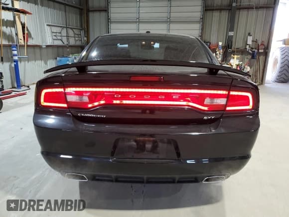 ✅ 2014 Dodge Charger SXT • VIN: 2C3CDXHG7EH334383 • Лот: 90489245. Опубликован ранее на Copart с пробегом 100 255 миль. Бесплатный доступ к архиву аукционных продаж из США и подробный отчёт об истории автомобиля на DreamBid. Изображение 6.