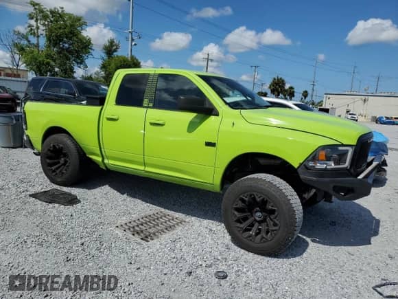 2015 Ram 1500 SLT with VIN 1C6RR6GT8FS553032, listed as a Copart auction lot 62288015 with 169,883 mi miles and Salvage title. Bid and sale history available at DreamBid. Image 4.