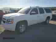 2014 Chevrolet Suburban LT z VIN 1GNSKJE70ER198068, wystawiony jako Copart lot #85145605 z przebiegiem 97 369 mil mil oraz Szkoda całkowita • Salvage title. Historia ofert i sprzedaży dostępna na DreamBid. Obrazek 1.