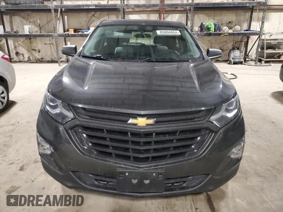 ✅ 2018 Chevrolet Equinox LS • VIN: 2GNAXREV4J6197117 • Lot: 85804864. Wystawiony na Copart z przebiegiem 55 865 mil. Bezpłatny archiwum sprzedaży aukcyjnych z USA i szczegółowy raport historii pojazdu na DreamBid. Zdjęcie 5.