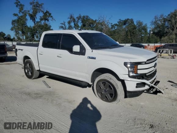 ✅ 2019 Ford F-150 Lariat • VIN: 1FTEW1E50KKD77045 • Lot: 92393025. Listed on Copart with 109,042 mi. Free auction sales archive from the USA and detailed vehicle history report at DreamBid. Image 4.