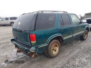 ✅ 1997 Chevrolet Blazer LS • VIN: 1GNCS13W1V2261394 • Lot: 41543411. Wystawiony na IAAI z przebiegiem 216 965 mil. Bezpłatny archiwum sprzedaży aukcyjnych z USA i szczegółowy raport historii pojazdu na DreamBid. Zdjęcie 6.