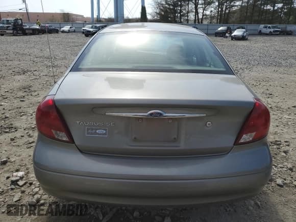 ✅ 2003 Ford Taurus SE Standard • VIN: 1FAFP53293A184262 • Лот: 52519225. Опубликован ранее на Copart с пробегом 104 965 миль. Бесплатный доступ к архиву аукционных продаж из США и подробный отчёт об истории автомобиля на DreamBid. Изображение 6.