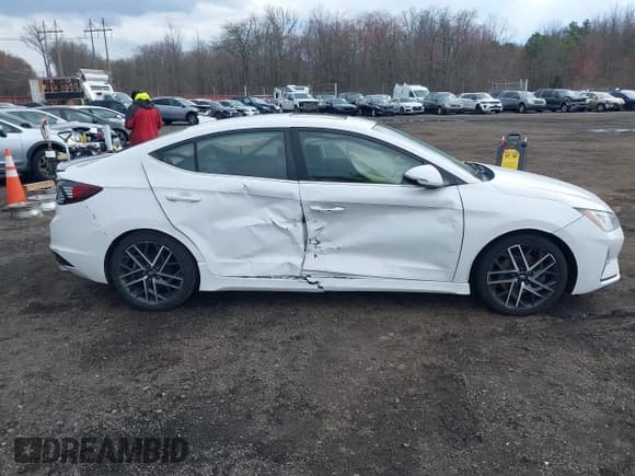 ✅ 2019 Hyundai Elantra Sport • VIN: KMHD04LB3KU841923 • Lot: 41887656. Listed on IAAI with 64,454 mi. Free auction sales archive from the USA and detailed vehicle history report at DreamBid. Image 13.