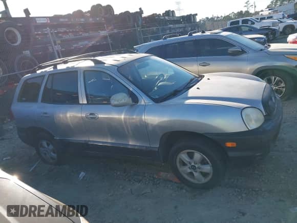 2005 Hyundai Santa Fe GLS z VIN KM8SC13D25U938582, wystawiony jako IAAI lot #41283607 z przebiegiem 176 212 mil mil oraz . Historia ofert i sprzedaży dostępna na DreamBid. Obrazek 13.