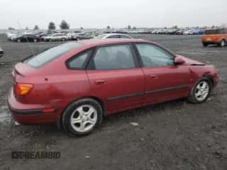 2002 Hyundai Elantra GT z VIN KMHDN55D82U052141, wystawiony jako Copart lot #79711964 z przebiegiem 192 328 mil mil oraz Szkoda całkowita • Salvage title. Historia ofert i sprzedaży dostępna na DreamBid. Obrazek 3.
