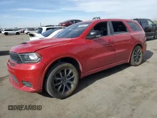 ✅ 2018 Dodge Durango R/T • VIN: 1C4SDHCT1JC345247 • Lot: 58092325. Listed on Copart with 128,479 mi. Free auction sales archive from the USA and detailed vehicle history report at DreamBid. Image 1.