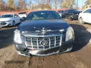 ✅ 2014 Cadillac CTS Performance • VIN: 1G6DG1E35E0169673 • Lot: 43698420. Listed on IAAI with 84,034 mi. Free auction sales archive from the USA and detailed vehicle history report at DreamBid. Image 12.
