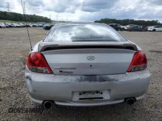 2005 Hyundai Tiburon GS с VIN KMHHM65D35U182780, выставлен на аукционе Copart как лот 58958295 с пробегом 186 652 миль миль и Чистый • Clean title. История ставок и продаж доступна на DreamBid. Изображение 6.