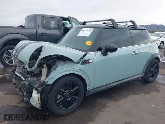 ✅ 2012 MINI Hardtop • VIN: WMWSU3C55CT264935 • Lot: 43774072. Listed on IAAI with 59,141 mi. Free auction sales archive from the USA and detailed vehicle history report at DreamBid. Image 2.