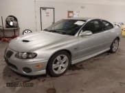 ✅ 2005 Pontiac GTO • VIN: 6G2VX12U55L367948 • Lot: 43061820. Listed on IAAI with 59,308 mi. Free auction sales archive from the USA and detailed vehicle history report at DreamBid. Image 2.