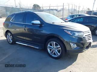 2018 Chevrolet Equinox Premier z VIN 2GNAXMEV0J6100403, wystawiony jako IAAI lot #43366412 z przebiegiem 65 799 mil mil oraz . Historia ofert i sprzedaży dostępna na DreamBid. Obrazek 1.