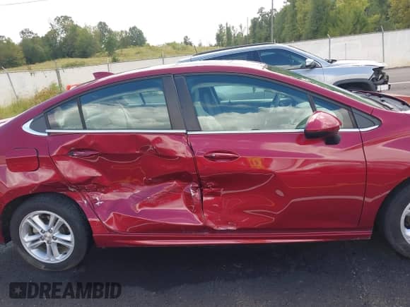 2018 Chevrolet Cruze LT with VIN 1G1BE5SM4J7217012, listed as a IAAI auction lot 43287685 with 125,689 mi miles and . Bid and sale history available at DreamBid. Image 13.